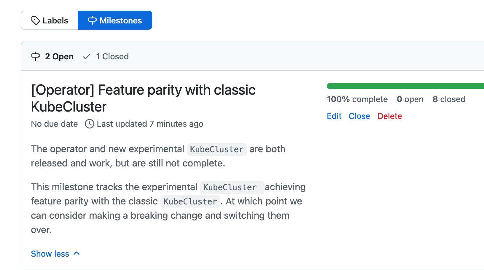 Screenshot of the KubeCluster feature parity milestone with 100% of tasks completed